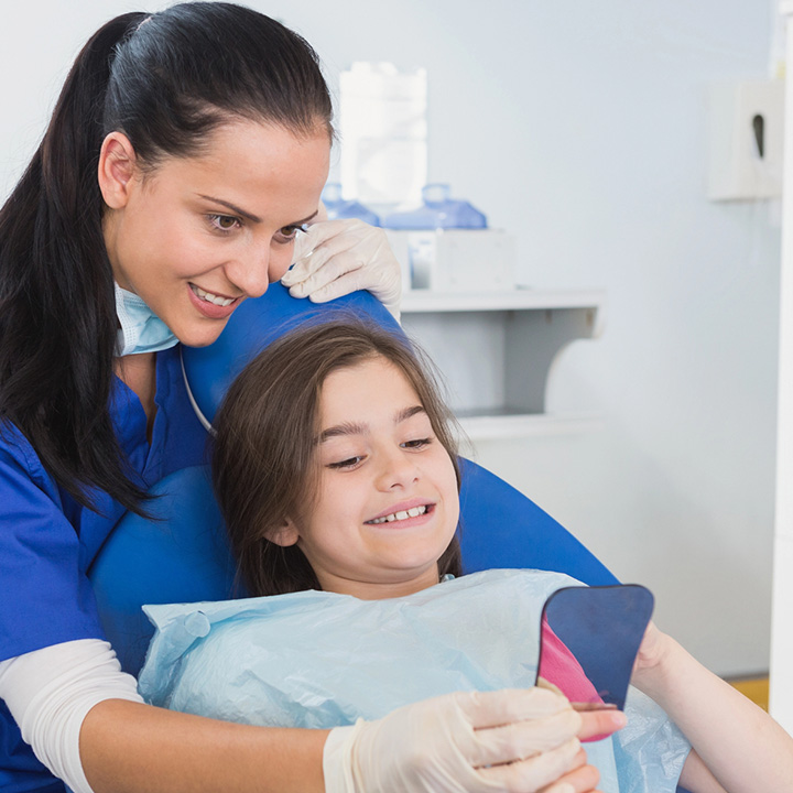 Child feeling happy and confident after a dental visit in Stafford, VA