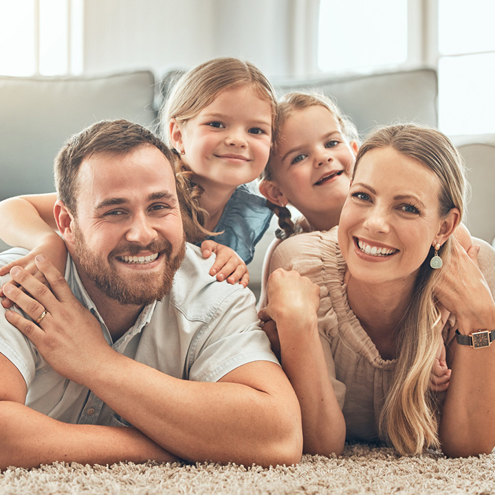 Smiling family after completing dental care for children in Stafford, VA