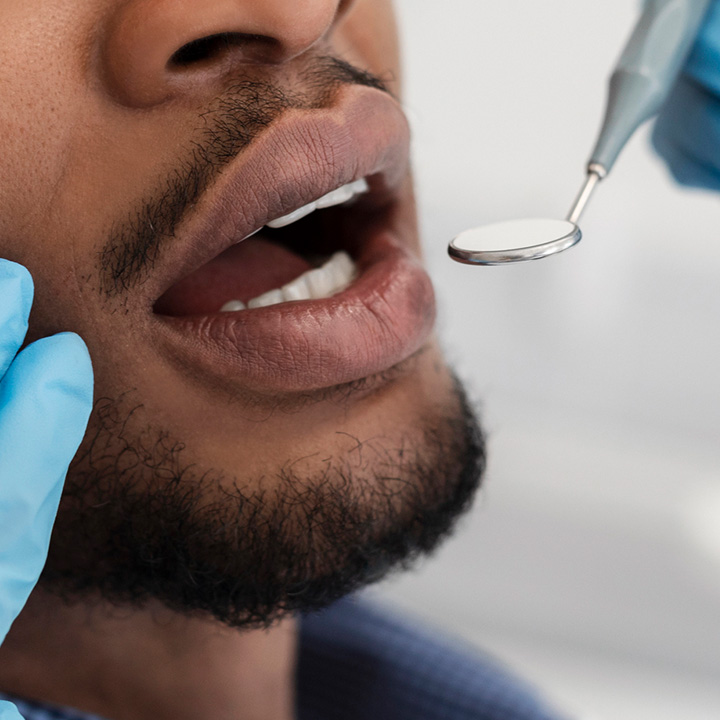 Man undergoing dental bonding procedure in Stafford, VA