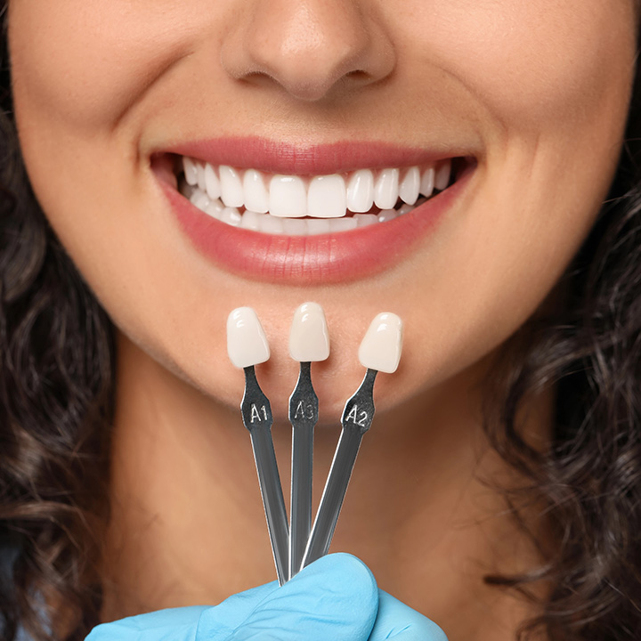Woman after receiving porcelain veneers in Stafford, VA